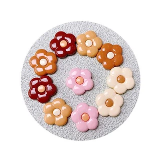 Abbellimenti di fiori in resina